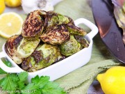 Roasted Brussels Sprouts with Garlic in a white serving dish.