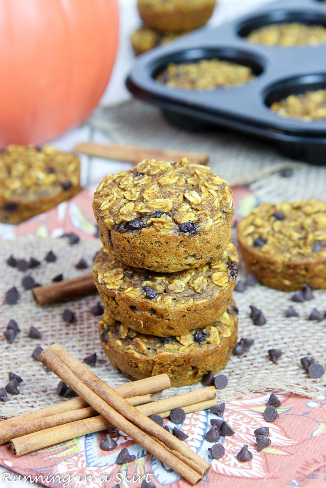 Pumpkin Baked Oatmeal Cups with pumpkin and baking dish in the background.