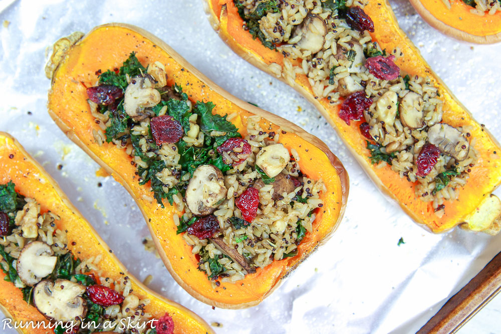 Vegetarian Stuffed Butternut Squash on a baking sheet ready to go in oven.