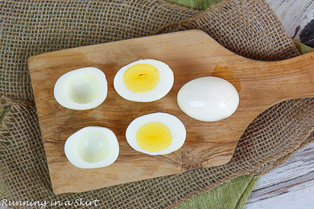 Process shot showing how to remove the yolk from the egg.