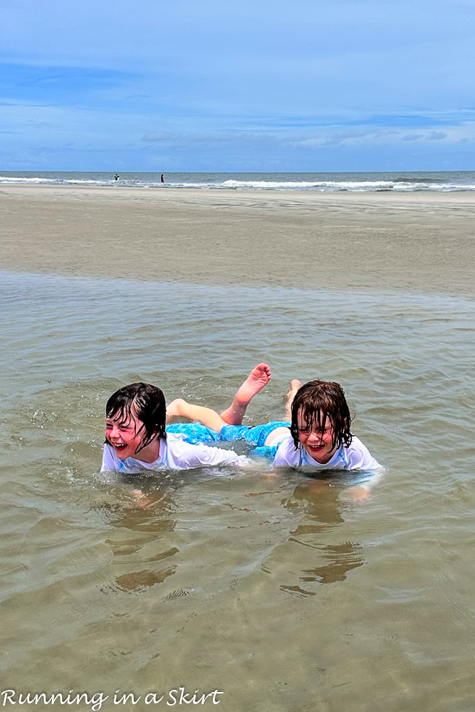 Kids playing in Hilton Head tidepool on the beach.