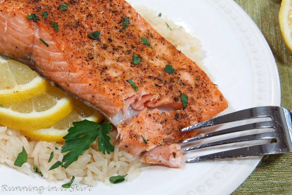 Steelhead Trout recipe close up with fork flaking the fish.