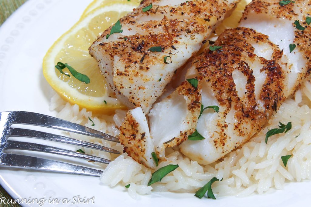 Air Fryer Cod flaking with a fork.